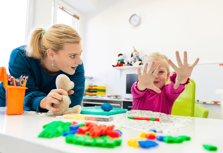 child in a childcare setting with a practitioner